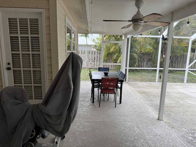 sunroom / solarium with ceiling fan