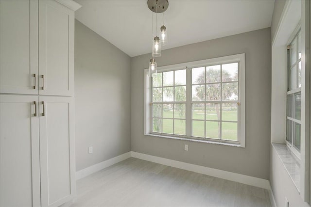 spare room featuring a wealth of natural light