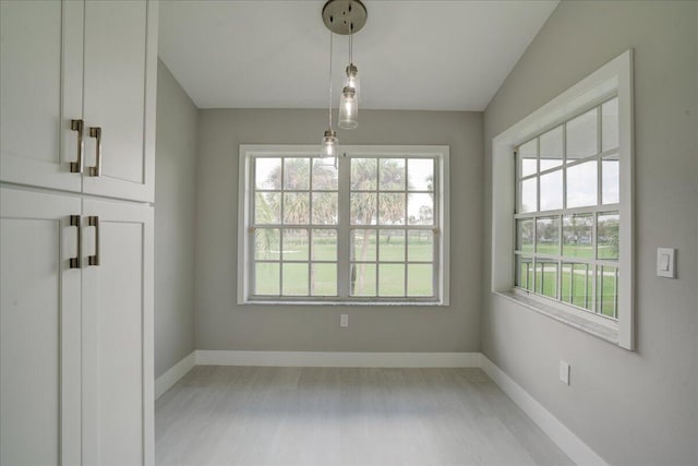 unfurnished dining area featuring a healthy amount of sunlight