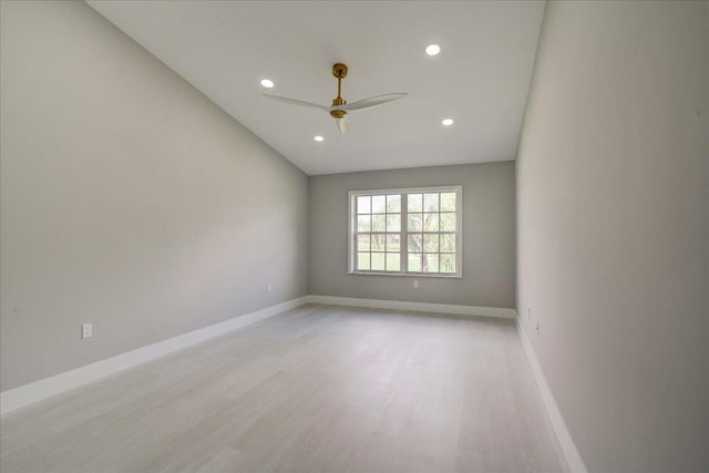 spare room featuring ceiling fan and light wood-type flooring