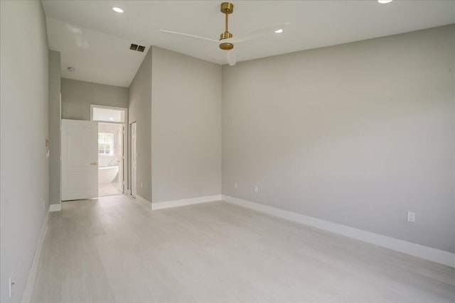 spare room with light hardwood / wood-style floors