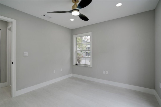 spare room featuring ceiling fan