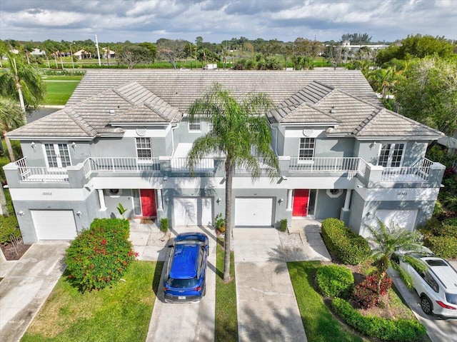 view of front of property with a balcony