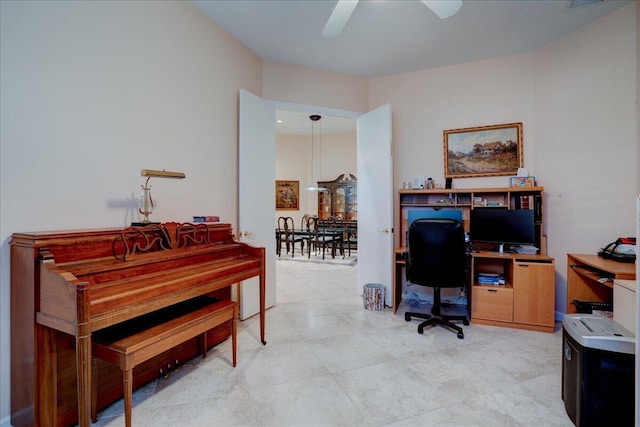 office space with ceiling fan