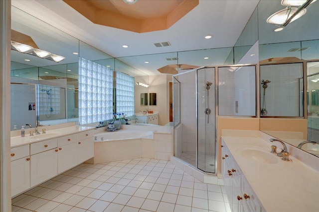 bathroom featuring separate shower and tub, tile patterned floors, and vanity