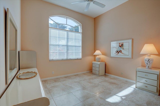 living area featuring ceiling fan