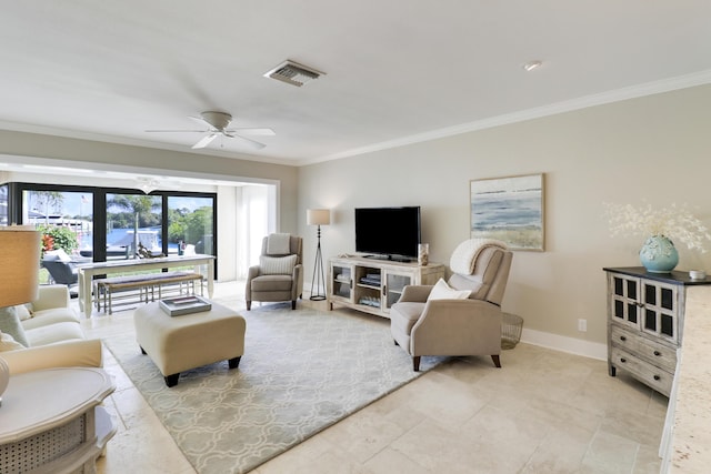 living room featuring ceiling fan and crown molding