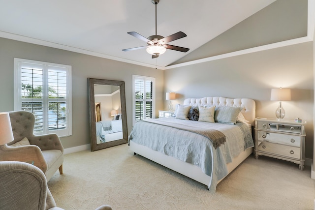 carpeted bedroom featuring lofted ceiling and ceiling fan