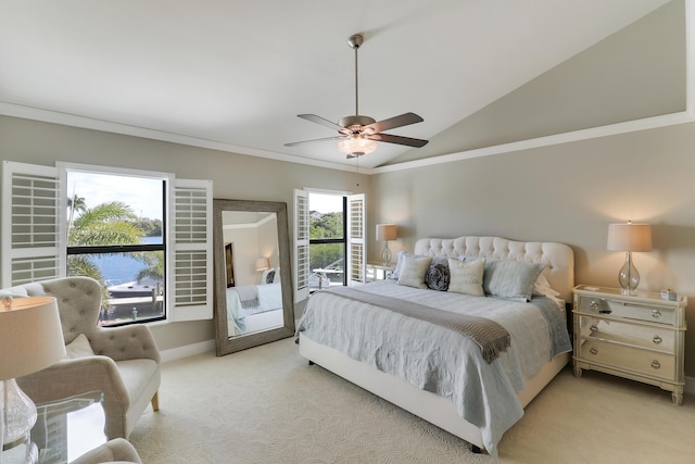 carpeted bedroom featuring access to outside, ornamental molding, ceiling fan, and vaulted ceiling