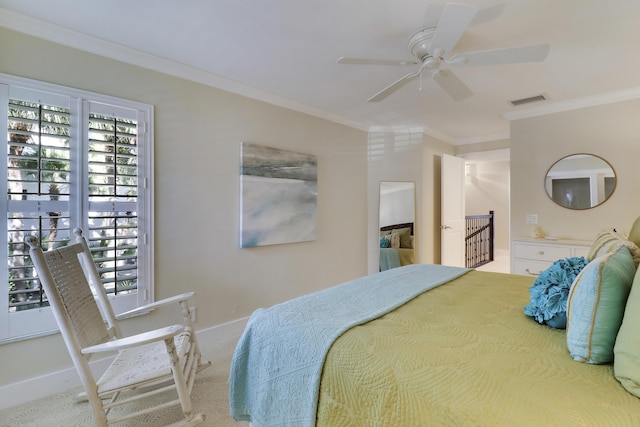 bedroom featuring ceiling fan, crown molding, and carpet