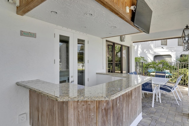 view of patio / terrace featuring a bar