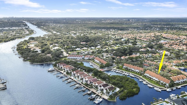 bird's eye view with a water view