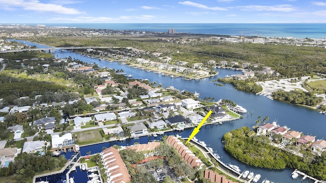 drone / aerial view featuring a water view