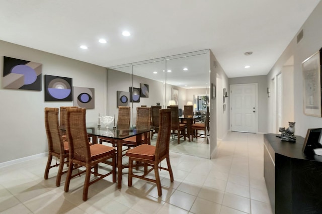 view of tiled dining space