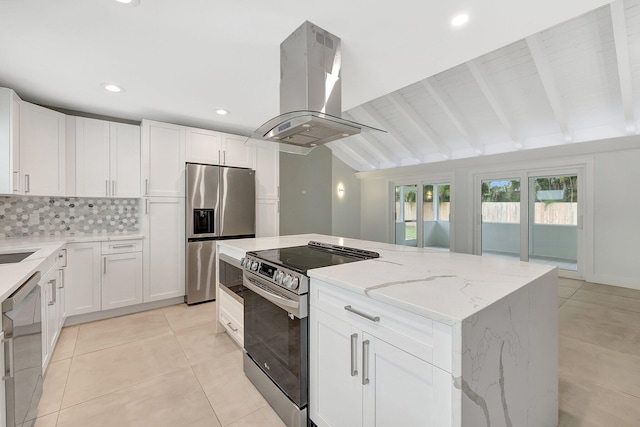 kitchen featuring island exhaust hood, white cabinetry, appliances with stainless steel finishes, and vaulted ceiling with beams