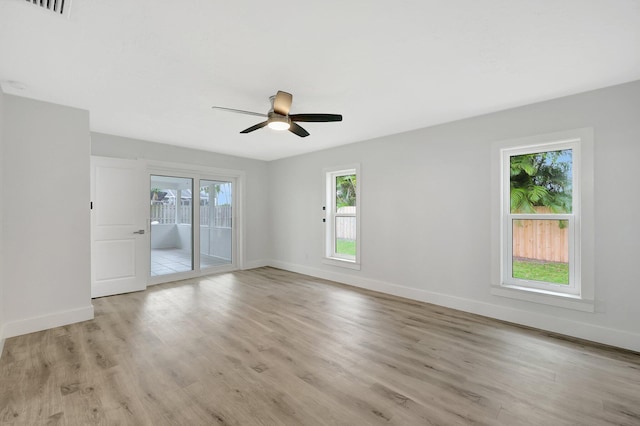 unfurnished room with ceiling fan and light hardwood / wood-style flooring