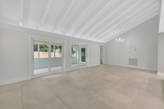 tiled spare room featuring beam ceiling, a notable chandelier, and high vaulted ceiling