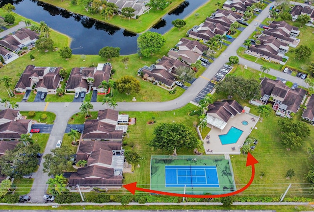 birds eye view of property featuring a water view