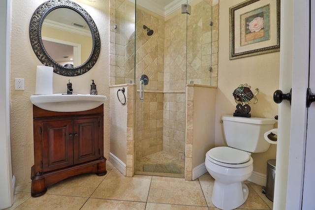 bathroom featuring tile patterned flooring, a shower with shower door, toilet, vanity, and crown molding