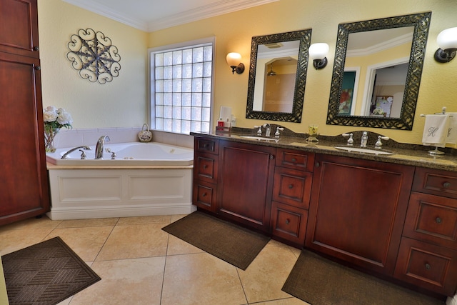 bathroom with vanity, tile patterned flooring, ornamental molding, and a bath