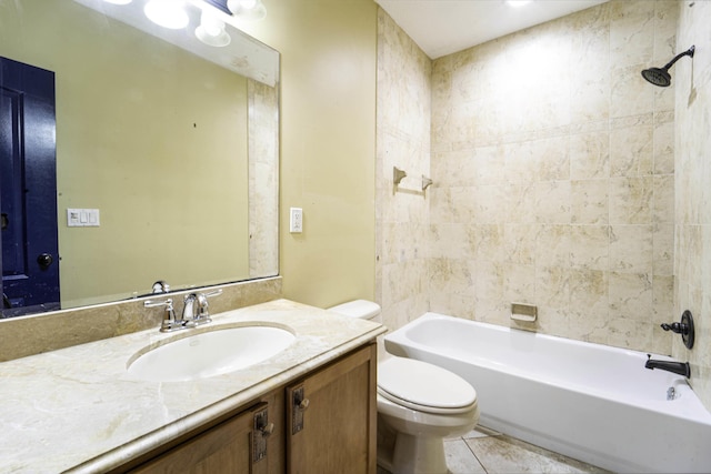 full bathroom with toilet, tiled shower / bath combo, tile patterned floors, and vanity