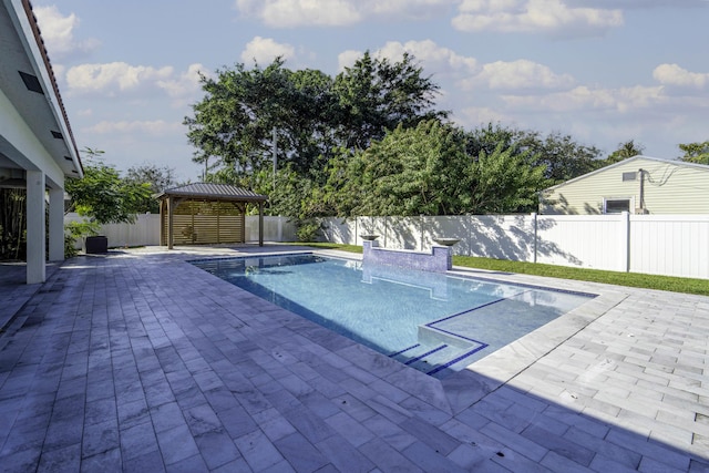 view of pool featuring a gazebo and a patio area