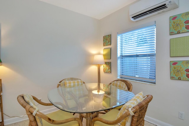 dining area with a wall mounted AC