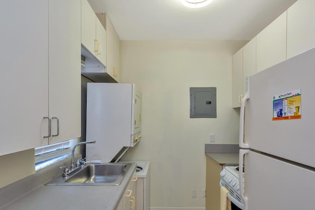 kitchen featuring white cabinetry, sink, electric panel, and white appliances