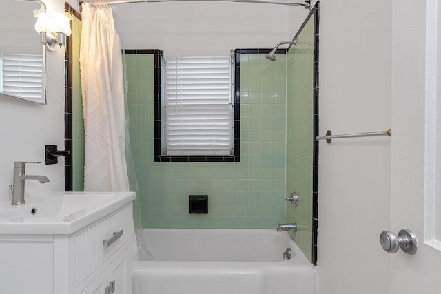 bathroom featuring shower / bath combination with curtain and vanity