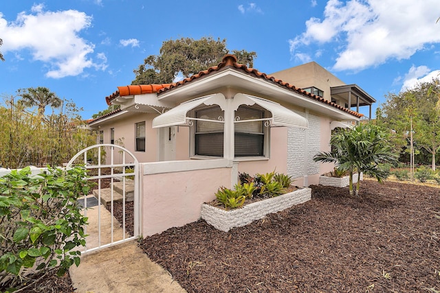 view of mediterranean / spanish house