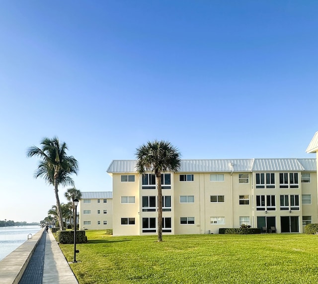 view of building exterior featuring a water view