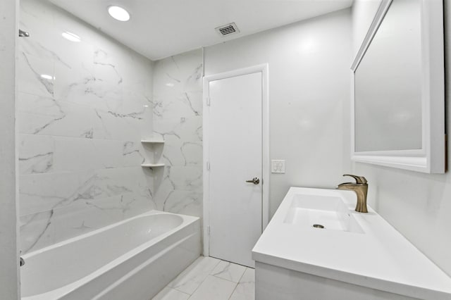 bathroom with shower / bath combination and vanity