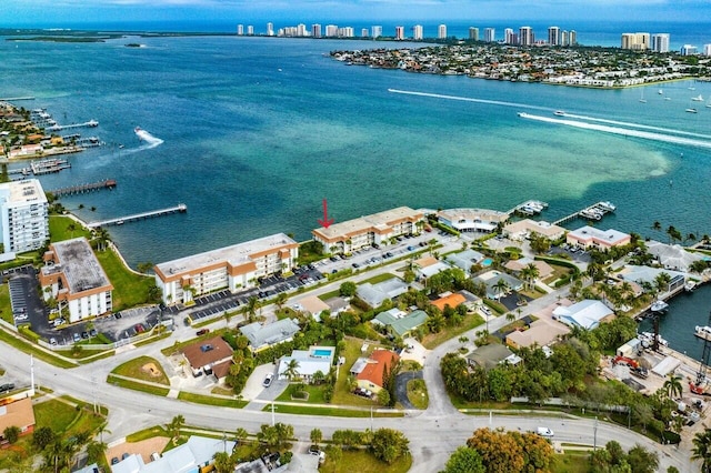 birds eye view of property featuring a water view