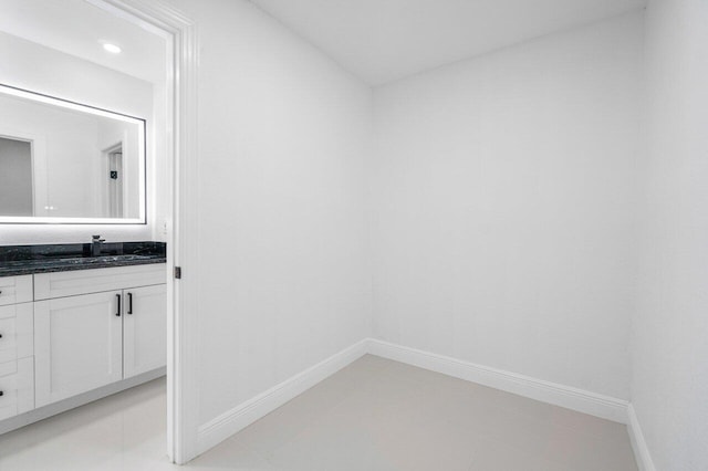 bathroom with vanity and tile patterned floors