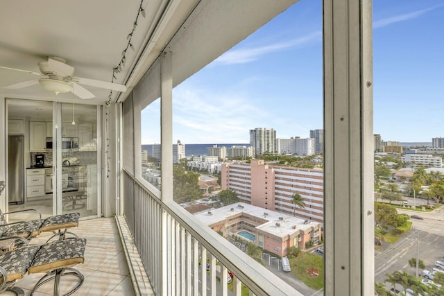 balcony featuring ceiling fan