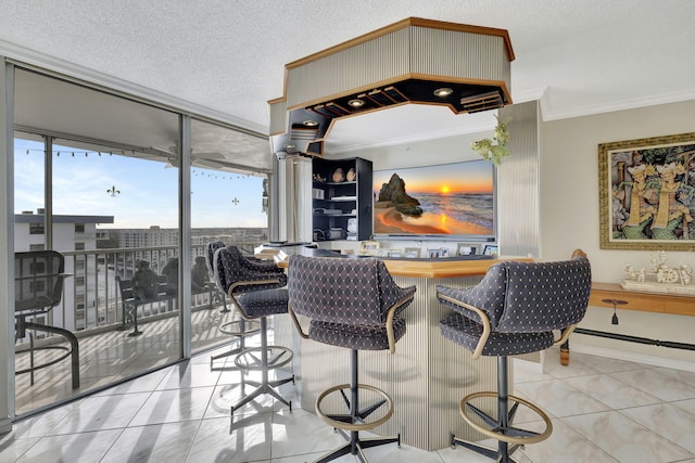 bar featuring expansive windows, light tile patterned flooring, crown molding, and a textured ceiling