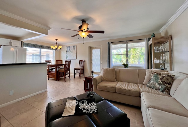 living room with crown molding, a wealth of natural light, and light tile patterned flooring