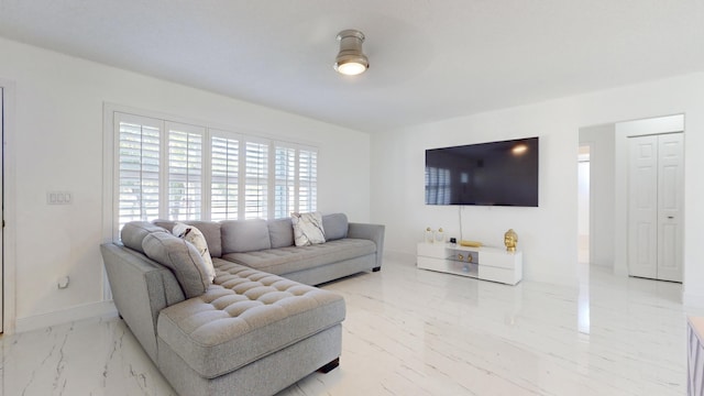 living room featuring ceiling fan