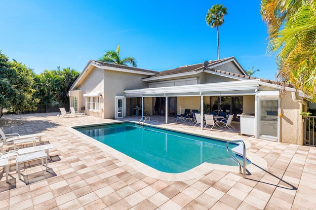 view of pool featuring a patio area