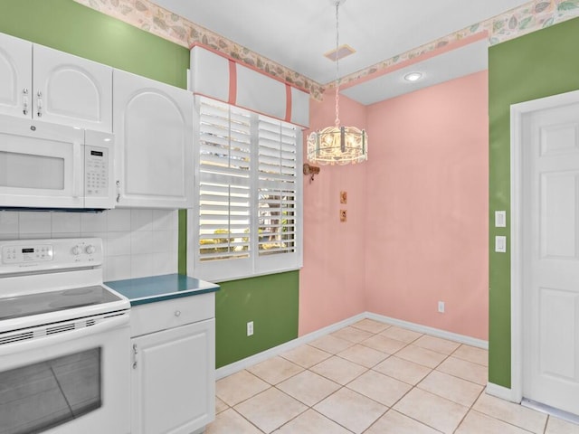 kitchen with white cabinetry, white appliances, tasteful backsplash, and hanging light fixtures