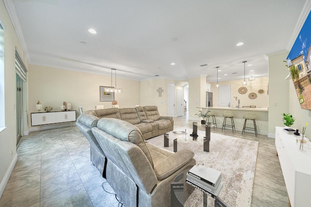 living room featuring crown molding