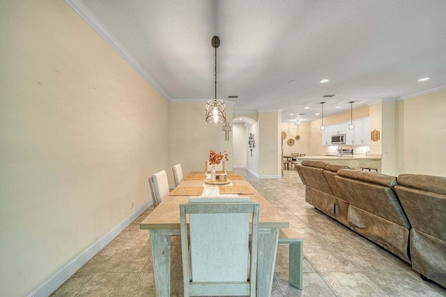 tiled dining area with crown molding