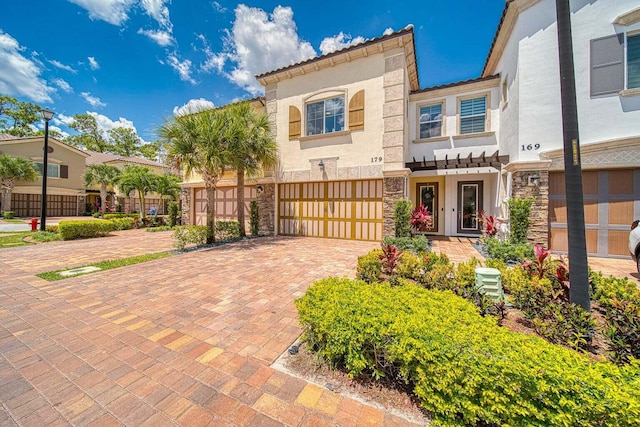 view of front of home with a garage