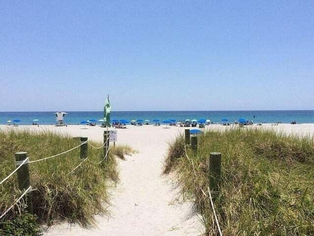 property view of water featuring a view of the beach