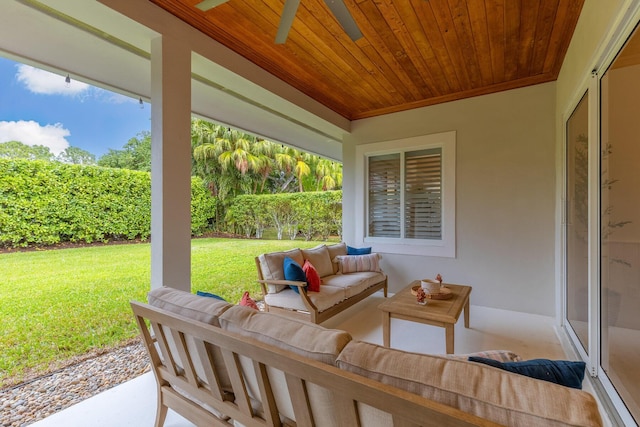 view of patio featuring an outdoor living space and ceiling fan