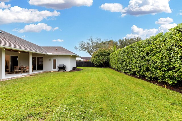 ranch-style home with a front lawn