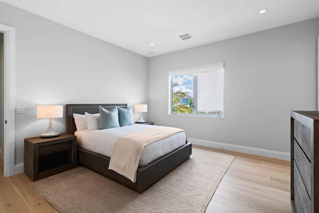 bedroom featuring light hardwood / wood-style flooring