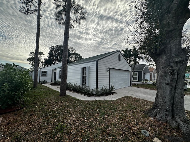 view of side of property with a yard