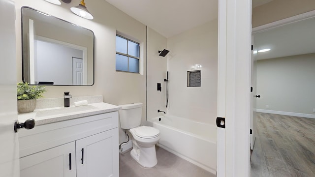 full bathroom with toilet, vanity, wood-type flooring, and shower / bath combination