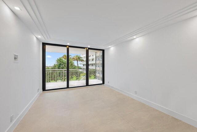 birds eye view of property with a water view and a view of the beach